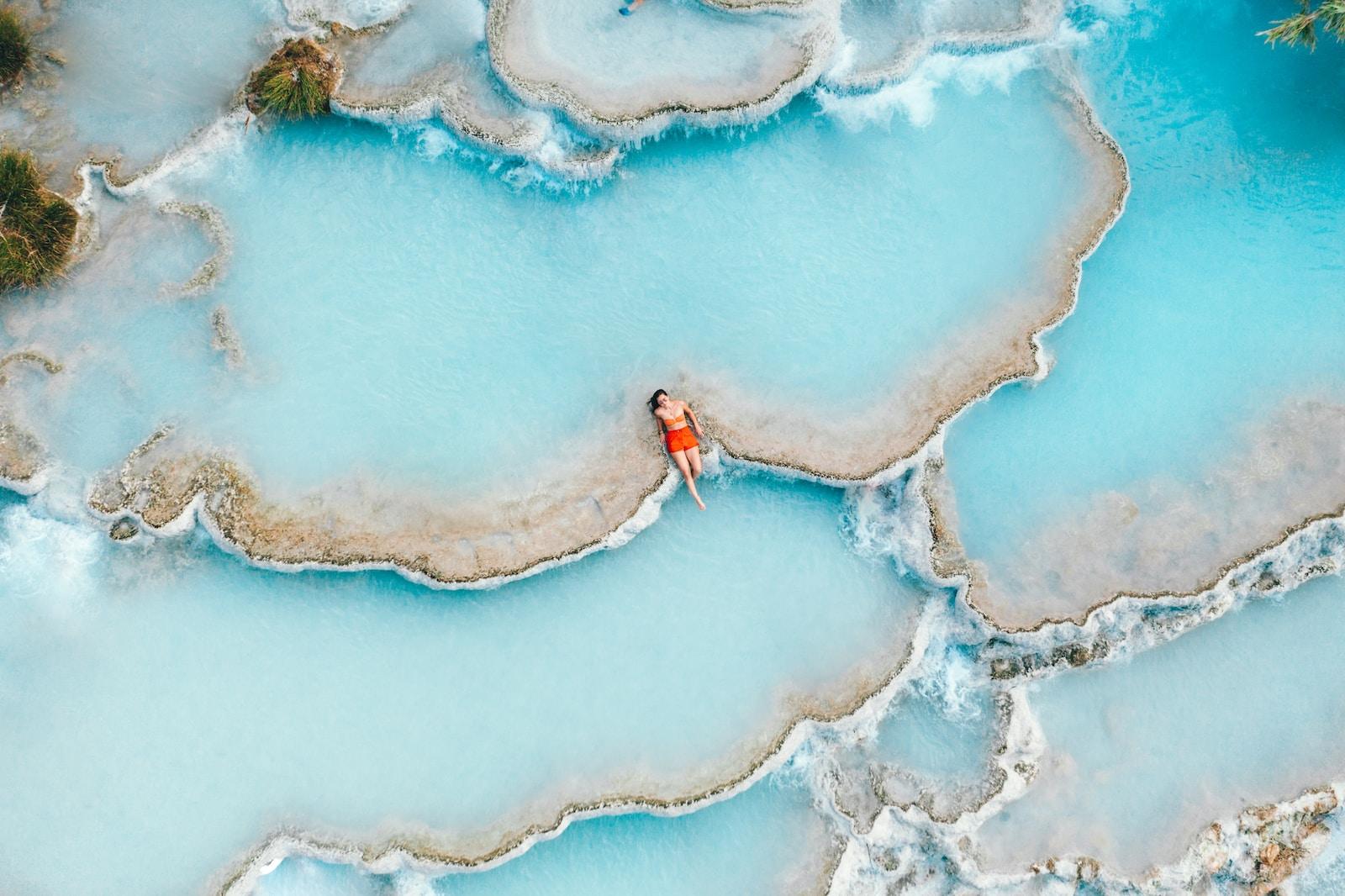Photo by Spencer Davis man sitting in body of water