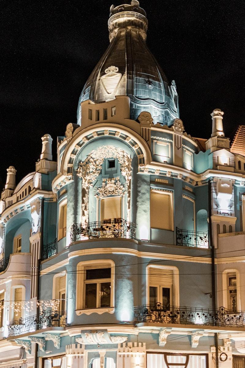 a large building with a clock on the top of it