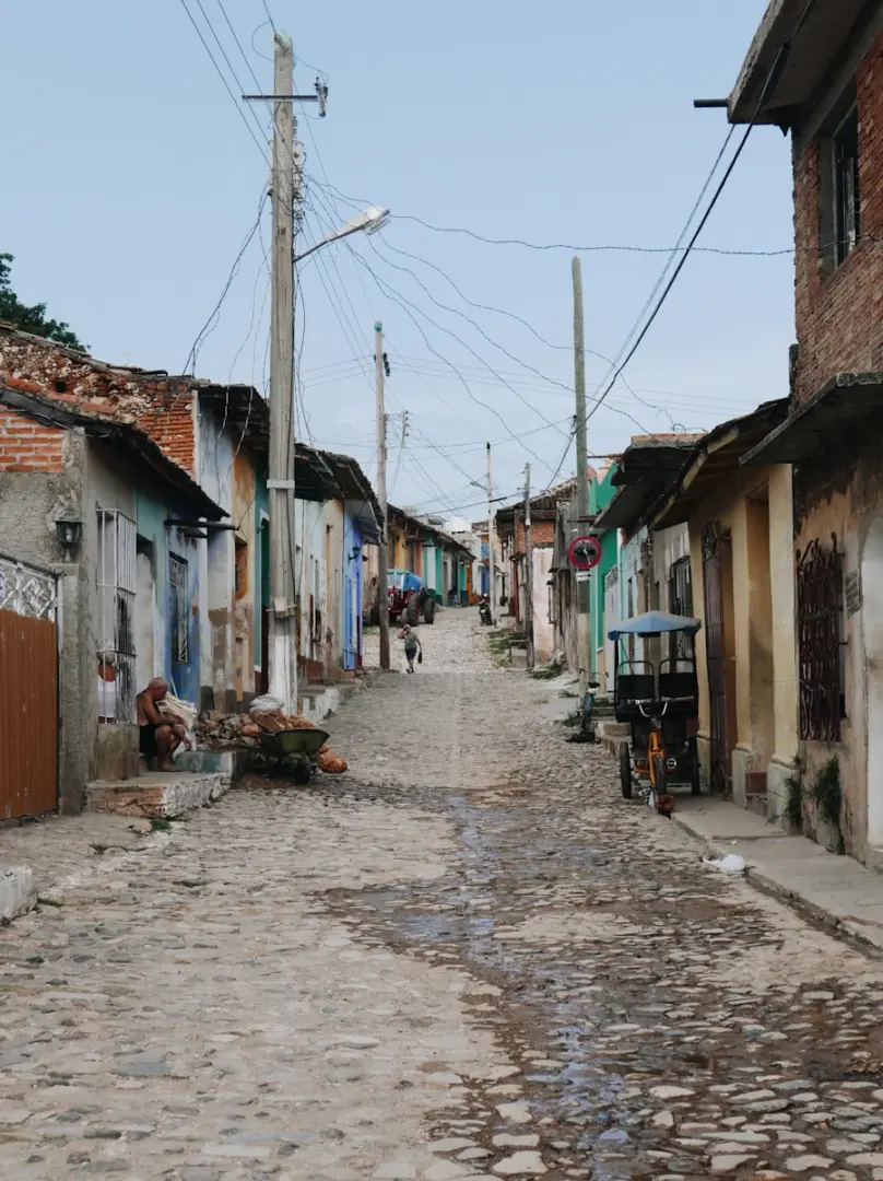 Photo by Falco Negenman a cobblestone street in a small village